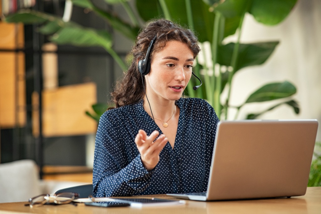 Lady managing call traffic with an effective call management system.Â